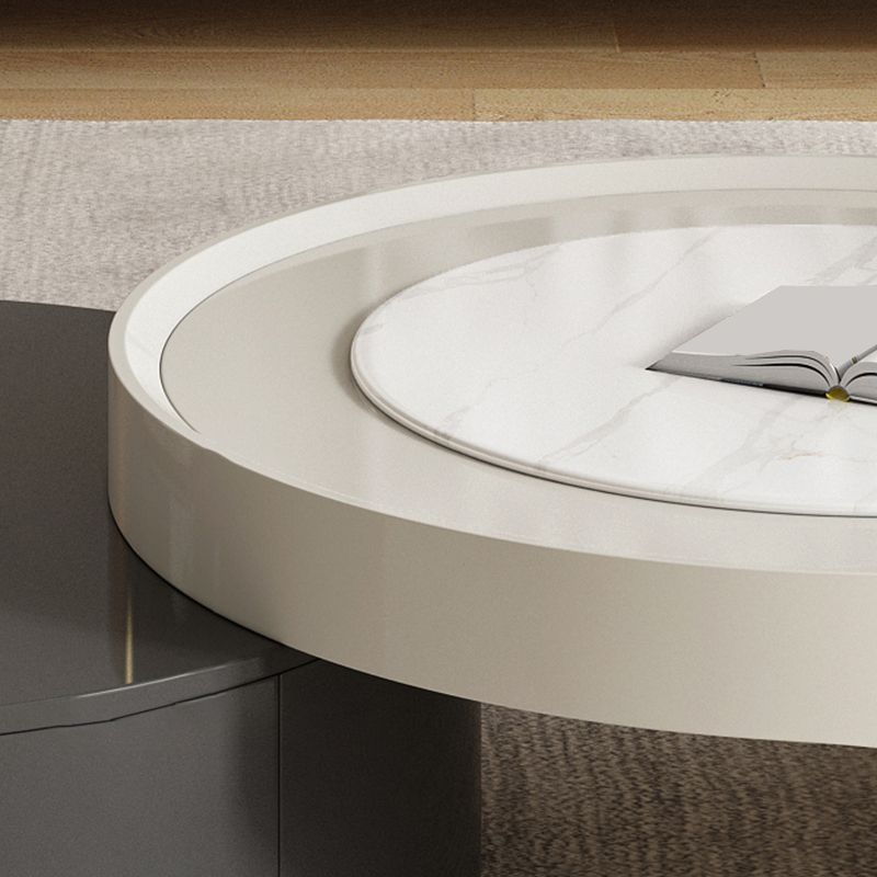 Eigentijdse ronde leisteen nestelende salontafel ingesteld met opslag