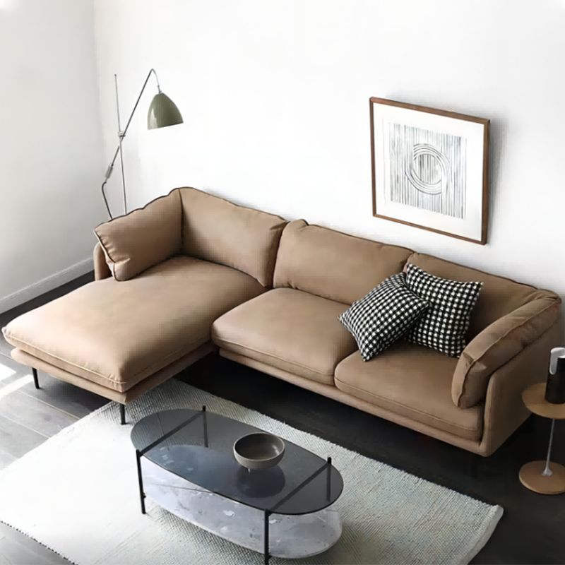 Seccionales de color marrón claro/sofá con almohada y brazo superior de almohada