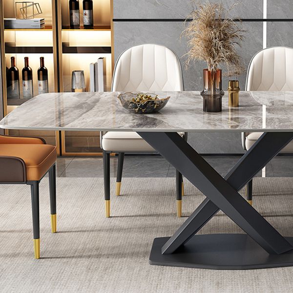 Mesa de comedor de piedra gris rectangular moderna con base de acero negro