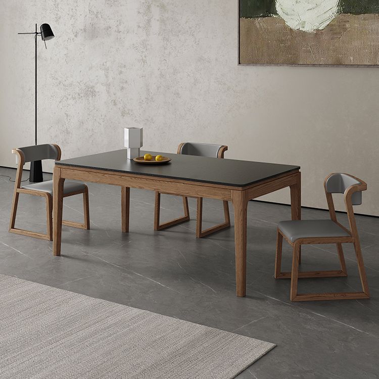 Moderne rechthoekige stenen eettafel met houten poten voor eetkamer