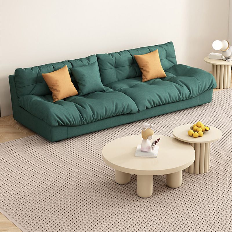 Sofá de tela verde oscuro asientos de apartamentos contemporáneos de apartamento