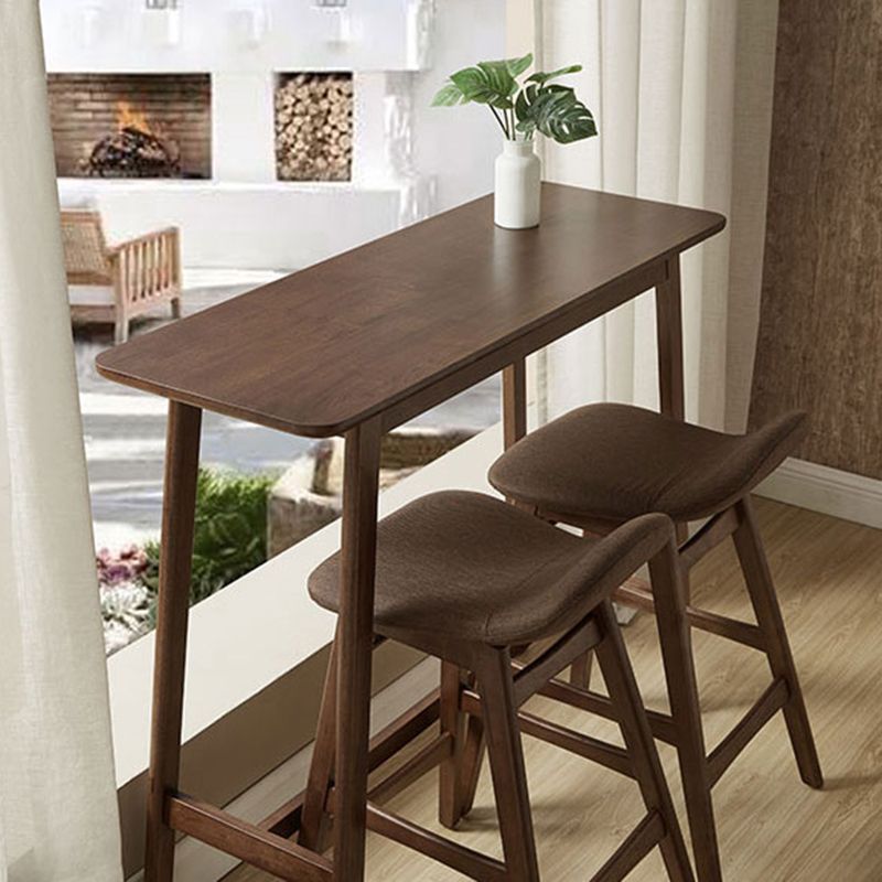 Contemporary Bar Dining Table Rectangle Wood Bar Table Trestle Base in Brown Clearhalo 'Bar Furniture' 'Bar Tables' 'bar_tables' 'Furniture' 'furniture_bar_tables' 'Kitchen & Dining Furniture' 'kitchen&dining_furn' 'kitchen' 1200x1200_f3a97c17-a77f-4547-bc89-0aa01d2f435e