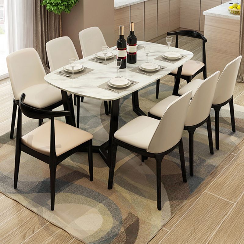 Mesa de comedor blanca de piedra rectangular moderna con base de caballete negro de cenizas