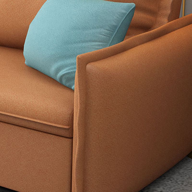 Canapé-lit orange en s'amuser avec 2 oreillers en arrière et bras carré