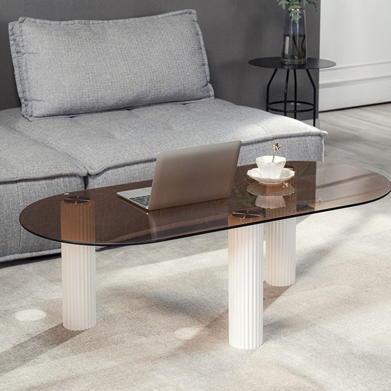 Contemporary Oval Glass Top Coffee Table with 3 Wooden Legs Cocktail Table Clearhalo 'Coffee & Accent Tables' 'Coffee Tables' 'coffee_tables' 'furn' 'furn_coffee_tables' 'Furniture' 'Living Room Furniture' 1200x1200_f5b807ff-568b-4a20-b44e-c0078c551107