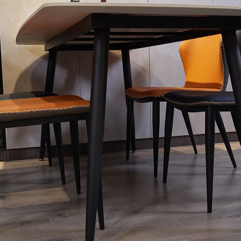 Rectangle Stone Top Dining Table Contemporary Dining Table with 4 Legs in Black Clearhalo 'Dining Tables & Seating' 'Dining Tables' 'dining_table' 'furn' 'furn_dining_table' 'Furniture' 'furniture_dining_table' 'Kitchen & Dining Furniture' 1200x1200_f60a5c65-97fe-4783-86f2-3eb642b91f74