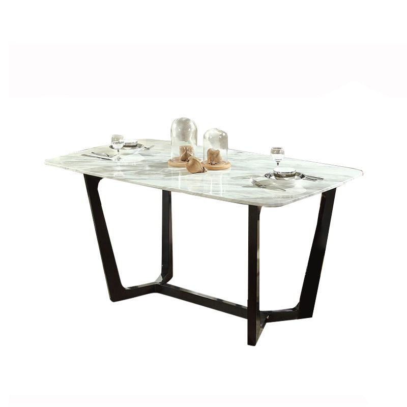 Mesa de comedor blanca de piedra rectangular moderna con base de caballete negro de cenizas