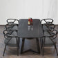 Mesa de comedor rectangular industrial de piedra sinterizada negra con base de metal