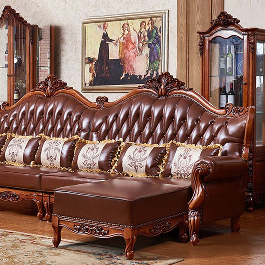 茶色の枕が付いた伝統的な房状のスプリットバックシートフレアアームソファ