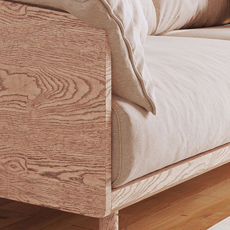 Scandinavische losse achterbank met kussen bovenarm in massief hout en linnen