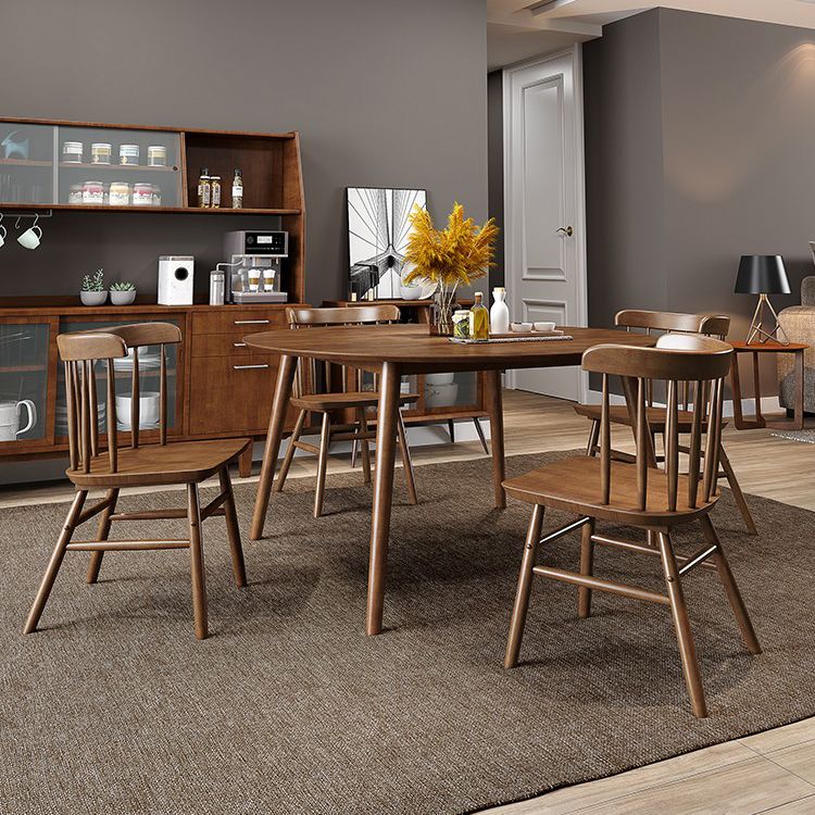 丸いダイニングテーブルモダン4脚木の色固定材のテーブル