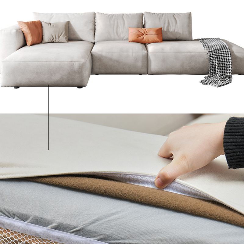 Sofá de brazo cuadrado de cuero falso con chaise moderno sofá de espalda suelta en gris