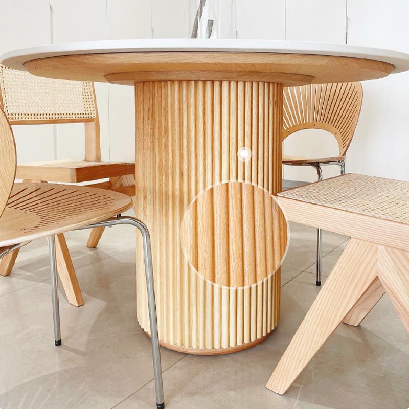 Mesa de comedor de piedra redonda mesa de pedestal de madera maciza en natural y negro