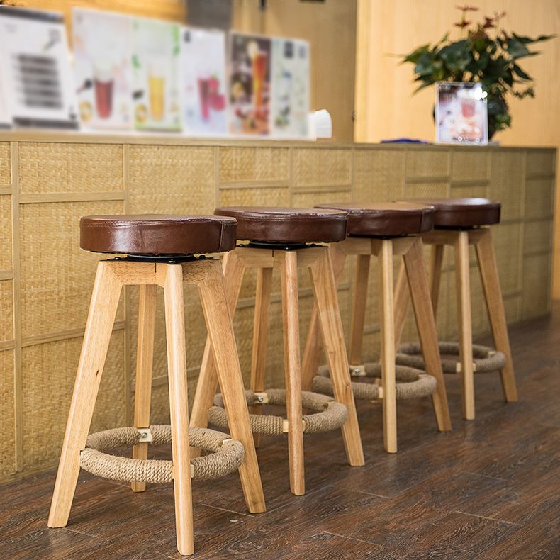 Modern Counter Bar Stool Armless Leather Bar Stool with Footrest and Swivel, Wood Base Clearhalo 'Bar Furniture' 'Bar Stools' 'bar_stools' 'furn' 'furn_bar_stools' 'furniture_bar_stools' 'Kitchen & Dining Furniture' 'kitchen&dining_furn' 'kitchen' 'kitchen_furn' Furniture' 1200x1200_fa58c325-f26d-4d36-8bcf-6a0a7ea9b16d