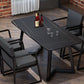 Mesa de comedor rectangular industrial de piedra sinterizada negra con base de metal
