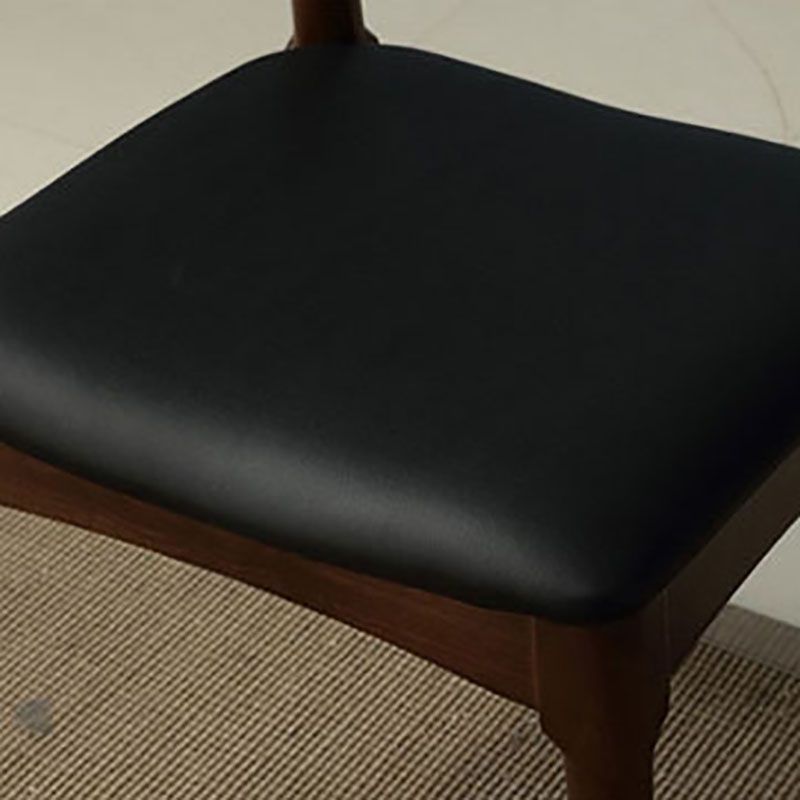 Sillas de comedor de cuero PU Diseño industrial Silla de comedor de espalda abierta