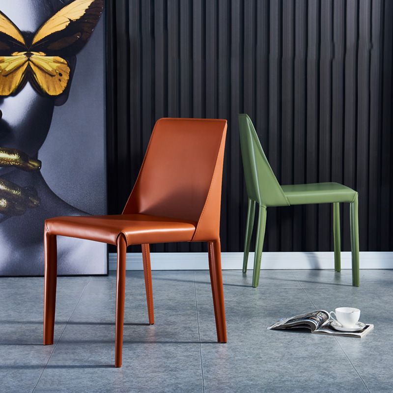 Eigentijdse metalen eetkamerstoel faux lederen armloze eetkamerstoel voor thuisgebruik