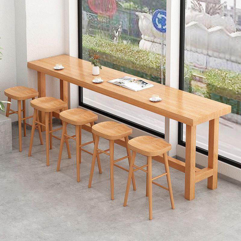 Modern Beige Wood Bar Dining Table Rectangle Indoor Bistro Table with Footrest Clearhalo 'Bar Furniture' 'Bar Tables' 'bar_tables' 'furn' 'furn_bar_tables' 'Furniture' 'furniture_bar_tables' 'Kitchen & Dining Furniture' 1200x1200_fb91073f-b964-4905-a9f5-6de5b06fe440