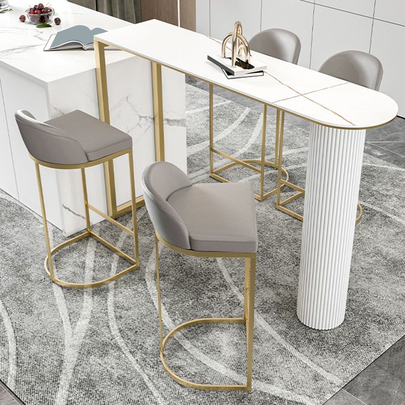 Sgabelli da pranzo glam a bracciale bassista.