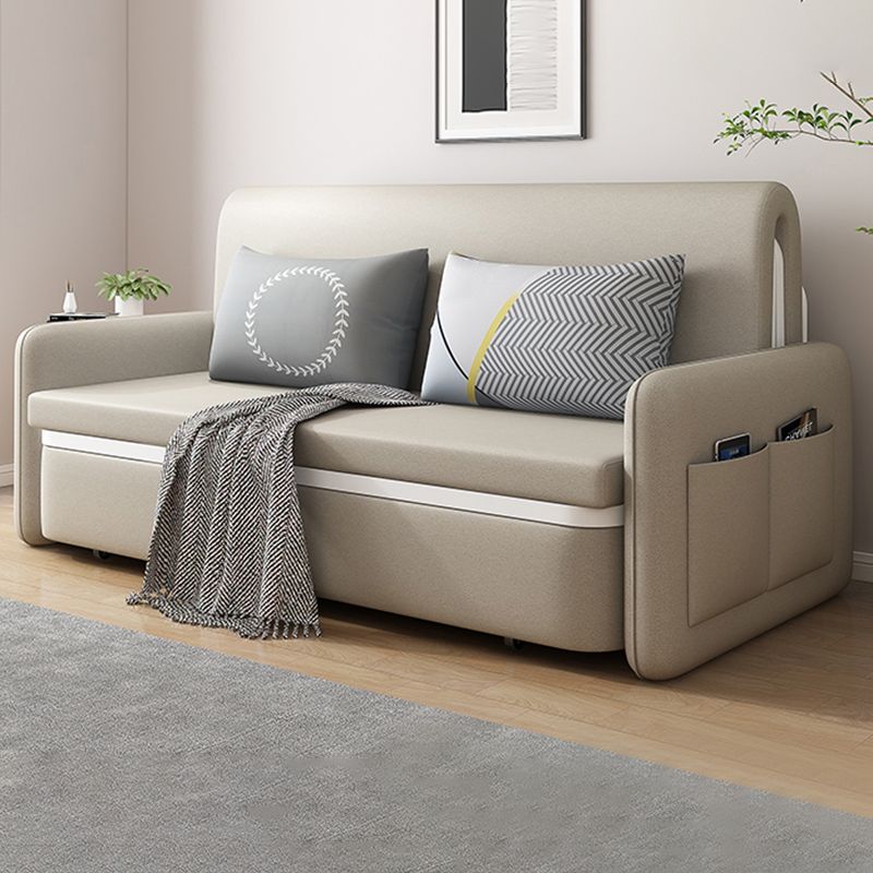 Sofá moderno de cuero de color beige color beige con almacenamiento de bolsillo