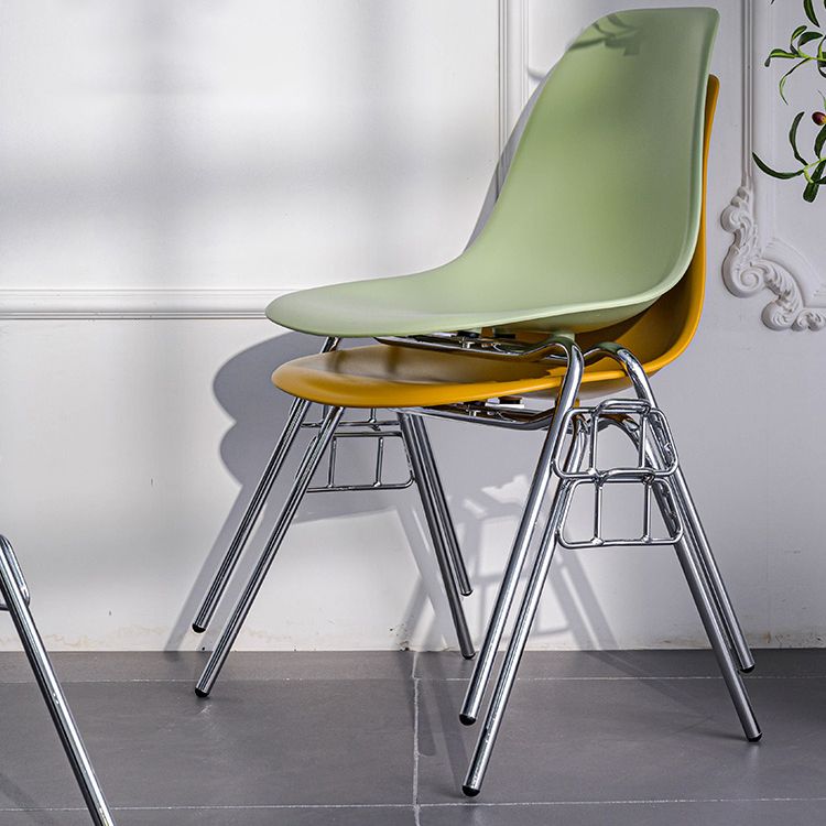 Minimalist Style Solid Back Plastic Chair for Home Use Stackable Armless Side Chair Clearhalo ' kitchen&dining_furn' 'Dining Chairs' 'Dining Tables & Seating' 'dining_chair' 'Furniture' 'furniture_dining_chair' 'Kitchen & Dining Furniture' 'kitchen' 1200x1200_fc92cbc6-a085-4afa-aac4-5edd2c0155b4