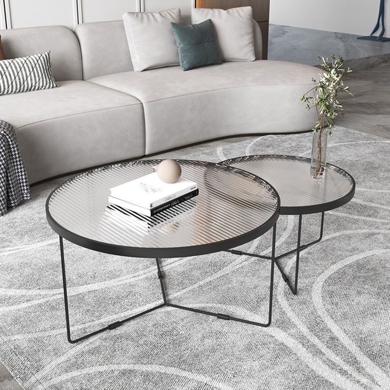 Moderner Stil runder geschärfter Glas Tisch mit Metallkreuzbeinen Couchtisch