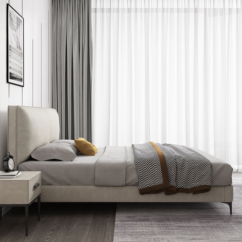 Modern wit houten standaardbed met rechthoekig paneelhoofdeinde