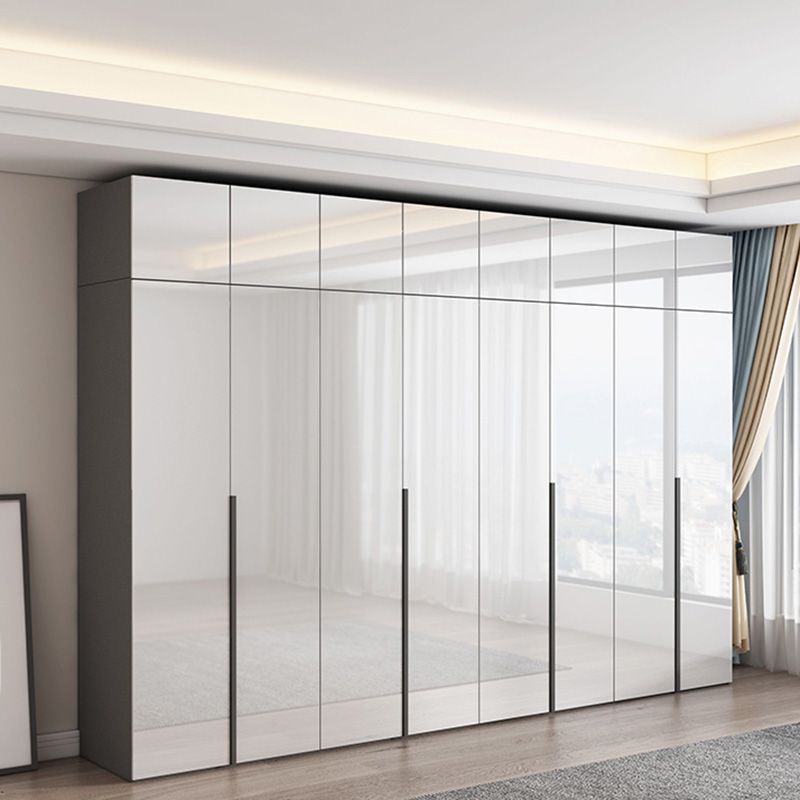 Dormitorio Gabinete de vestuario de madera Armario moderno con suaves puertas cerradas