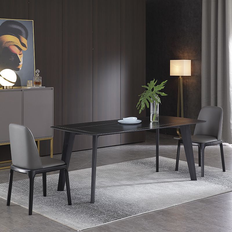 Table à manger noire rectangle industrielle en pierre fritrée avec 4 jambes