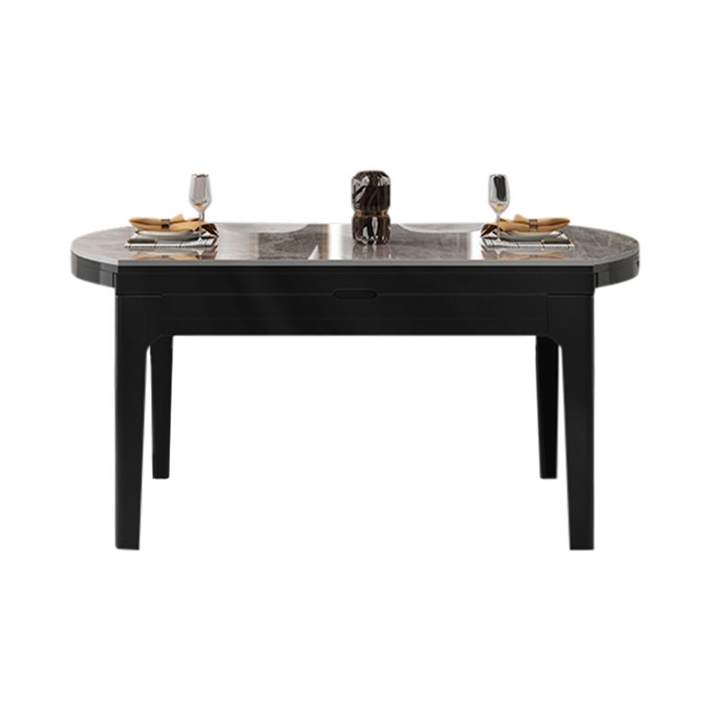 Moderner runder graues Steinoberteil ausziehbar einziehbarer Esstisch mit 4 schwarzen Beinen mit Gummiholzbeinen