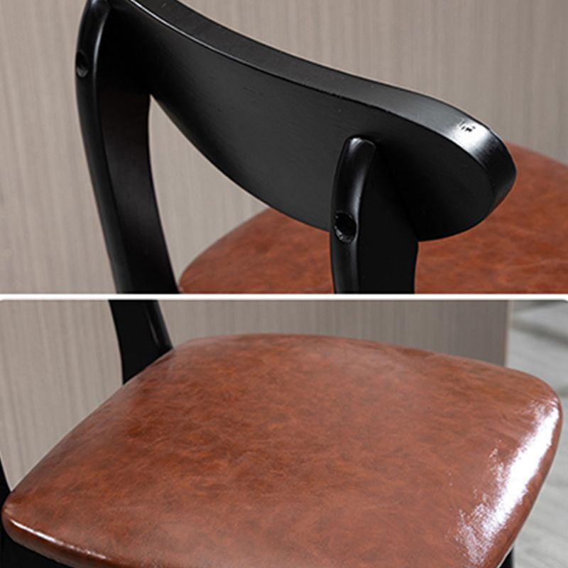 Sgabelli da bar imbottiti da bar in legno solido industriale con gambe nere