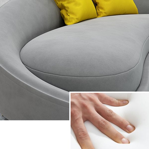 タイトな背中とアパート用のタキシードアームを備えた超近代的な湾曲したソファー