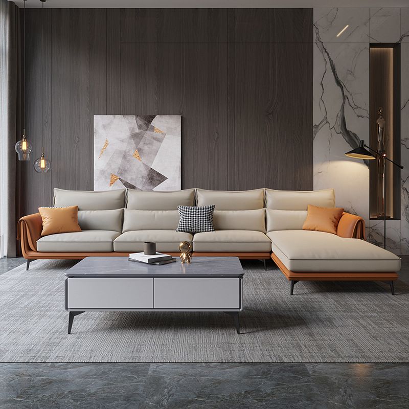 Flared Arm Sectional with Chaise Orange Faux Leather 4-seat Sectional Clearhalo 'furn' 'furn_sectionals' 'Furniture' 'Living Room Furniture' 'Sectionals' 1200x1200_ff72e0bc-ca94-455e-a0be-7eab5bb1fc7b