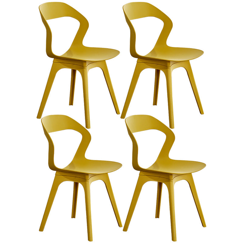 Scandinavian Home Side Chair Indoor Open Back Plastic Dining Room Chair Set Yellow 4 Piece Set Plastic Clearhalo ' kitchen&dining_furn' 'Dining Chairs' 'Dining Tables & Seating' 'dining_chair' 'furn' 'furn_dining_chair' 'Furniture' 'furniture_dining_chair' 'Kitchen & Dining Furniture' 'kitchen' 3541256