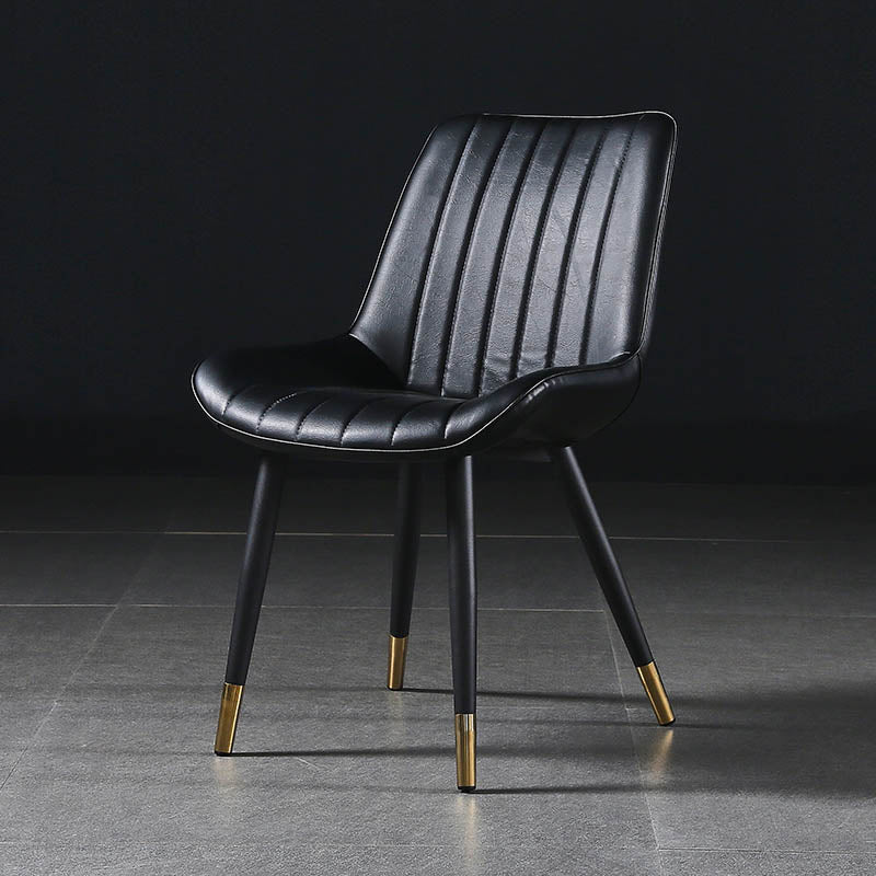 Modern Design Faux Leather Side Chair with 4 Metal Black Finish Legs Solid Back Armless Chair Black 1 Piece Brass Gold Clearhalo ' kitchen&dining_furn' 'Dining Chairs' 'Dining Tables & Seating' 'dining_chair' 'furn' 'furn_dining_chair' 'Furniture' 'furniture_dining_chair' 'Kitchen & Dining Furniture' 'kitchen' 3565115