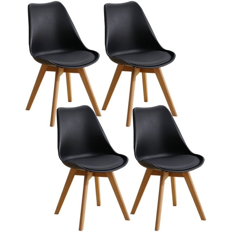 Scandinavian Home Side Chair Indoor Solid Back Plastic Dining Room Chair with Wood Legs Black Set of 4 Clearhalo ' kitchen&dining_furn' 'Dining Chairs' 'Dining Tables & Seating' 'dining_chair' 'Furniture' 'furniture_dining_chair' 'Kitchen & Dining Furniture' 'kitchen' 3573877