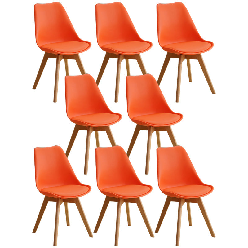 Scandinavian Home Side Chair Indoor Solid Back Plastic Dining Room Chair with Wood Legs Orange Set of 8 Clearhalo ' kitchen&dining_furn' 'Dining Chairs' 'Dining Tables & Seating' 'dining_chair' 'Furniture' 'furniture_dining_chair' 'Kitchen & Dining Furniture' 'kitchen' 3573899
