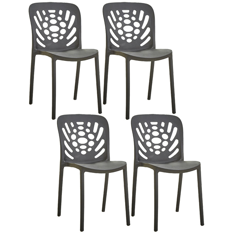 Glam Style Plastic Stackable Side Chair Matte Finish Dining Chair for Home Use Black Open 4 Piece Set Clearhalo ' kitchen&dining_furn' 'Dining Chairs' 'Dining Tables & Seating' 'dining_chair' 'furn' 'furn_dining_chair' 'Furniture' 'furniture_dining_chair' 'Kitchen & Dining Furniture' 'kitchen' 3574152