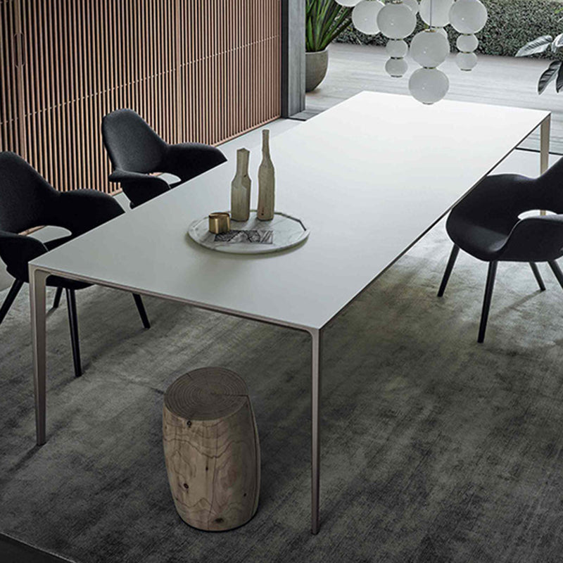 Simplicity Sintered Stone Dining Table Rectangular Table with Metallic Four-leg Clearhalo ' dining_table' 'Dining Tables & Seating' 'Dining Tables' 'Furniture' 'furniture_dining_table' 'Kitchen & Dining Furniture' 'kitchen&dining_furn' 'kitchen' 'kitchen_dining_table' 3582510