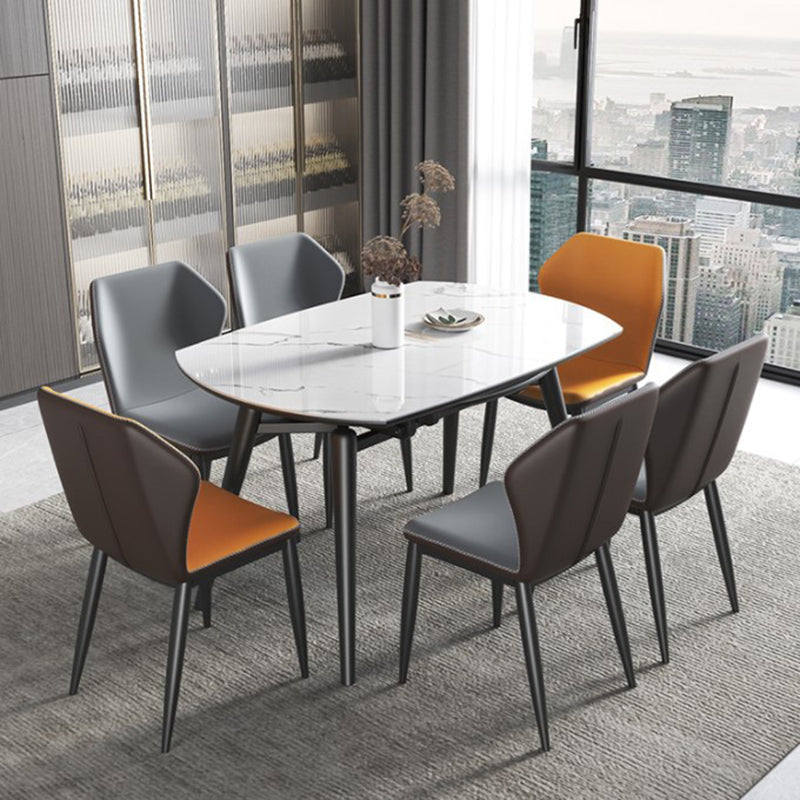 Modern Round Dining Table Sintered Stone Dining Table with 4 Black Legs,53.1"L x 31.5"W x 30"H Clearhalo ' dining_table' 'Dining Tables & Seating' 'Dining Tables' 'furn' 'furn_dining_table' 'Furniture' 'furniture_dining_table' 'Kitchen & Dining Furniture' 'kitchen&dining_furn' 'kitchen' 'kitchen_dining_table' 3642360