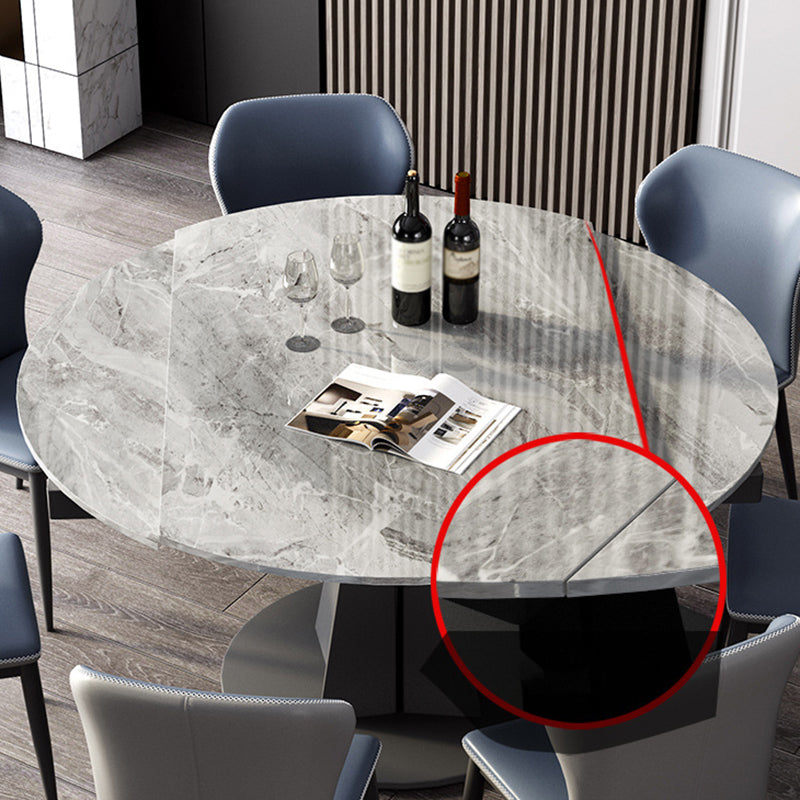Modern Round Drop-Leaf Dining Table Sintered Stone Table with Pedestal Base,53.1"L x 33.5"W x 30"H Clearhalo ' dining_table' 'Dining Tables & Seating' 'Dining Tables' 'furn' 'furn_dining_table' 'Furniture' 'furniture_dining_table' 'Kitchen & Dining Furniture' 'kitchen&dining_furn' 'kitchen' 'kitchen_dining_table' 3642709