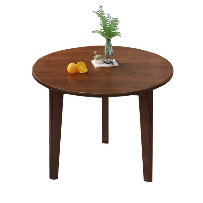 Round Wood Color Dining Table Rubberwood Solid Wood Table Modern with 4 Legs Pedestal Walnut 31.5"L x 31.5"W x 29.5"H Without Chairs Clearhalo ' dining_table' 'Dining Tables & Seating' 'Dining Tables' 'furn' 'furn_dining_table' 'Furniture' 'furniture_dining_table' 'Kitchen & Dining Furniture' 'kitchen&dining_furn' 'kitchen' 'kitchen_dining_table' 3643060