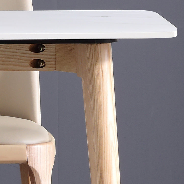 Sintered Stone Modern Rectangle Dining Table White Stone Top Table with Wooden 4 Legs Clearhalo ' dining_table' 'Dining Tables & Seating' 'Dining Tables' 'furn' 'furn_dining_table' 'Furniture' 'furniture_dining_table' 'Kitchen & Dining Furniture' 'kitchen&dining_furn' 'kitchen' 'kitchen_dining_table' 3643426