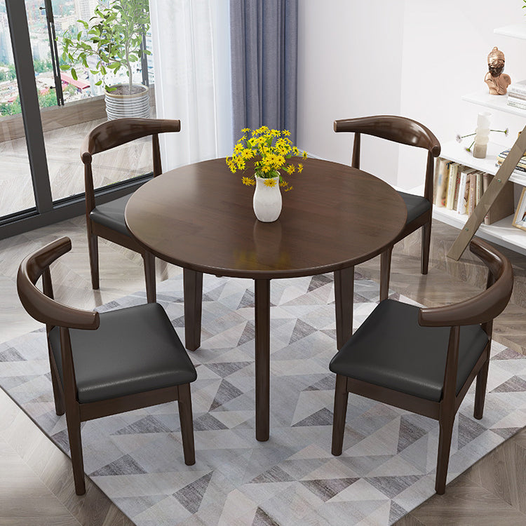 Round Shape 4 Legs Modern Dining Table Wood Color Fixed Table of Solid Wood Clearhalo ' dining_table' 'Dining Tables & Seating' 'Dining Tables' 'furn' 'furn_dining_table' 'Furniture' 'furniture_dining_table' 'Kitchen & Dining Furniture' 'kitchen&dining_furn' 'kitchen' 'kitchen_dining_table' 3662489
