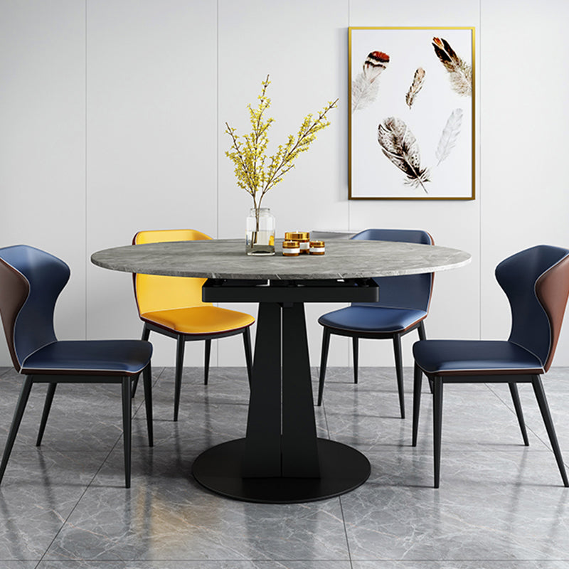 Modern Round Dining Table Sintered Stone Table with Black Pedestal Base,47.2"L x 32.7"W x 30"H Clearhalo ' dining_table' 'Dining Tables & Seating' 'Dining Tables' 'furn' 'furn_dining_table' 'Furniture' 'furniture_dining_table' 'Kitchen & Dining Furniture' 'kitchen&dining_furn' 'kitchen' 'kitchen_dining_table' 3670745
