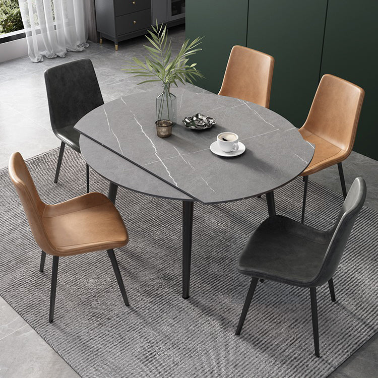 52" Round Sintered Stone Top Table Extendable 4 Legs Dining Table, Metal in Black Clearhalo ' dining_table' 'Dining Tables & Seating' 'Dining Tables' 'furn' 'furn_dining_table' 'Furniture' 'furniture_dining_table' 'Kitchen & Dining Furniture' 'kitchen&dining_furn' 'kitchen' 'kitchen_dining_table' 3703921