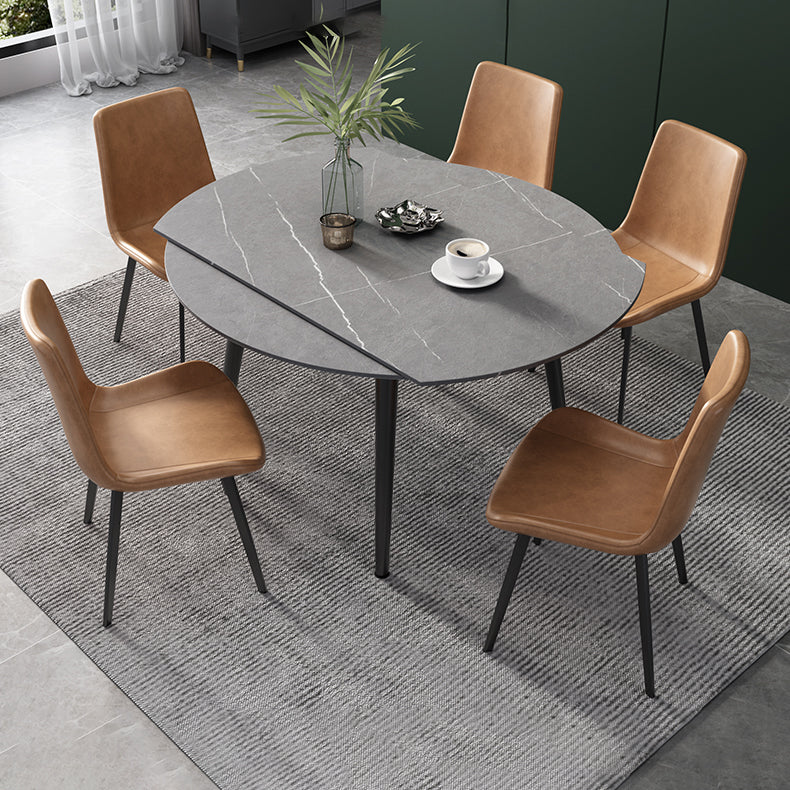52" Round Sintered Stone Top Table Extendable 4 Legs Dining Table, Metal in Black Clearhalo ' dining_table' 'Dining Tables & Seating' 'Dining Tables' 'furn' 'furn_dining_table' 'Furniture' 'furniture_dining_table' 'Kitchen & Dining Furniture' 'kitchen&dining_furn' 'kitchen' 'kitchen_dining_table' 3703928