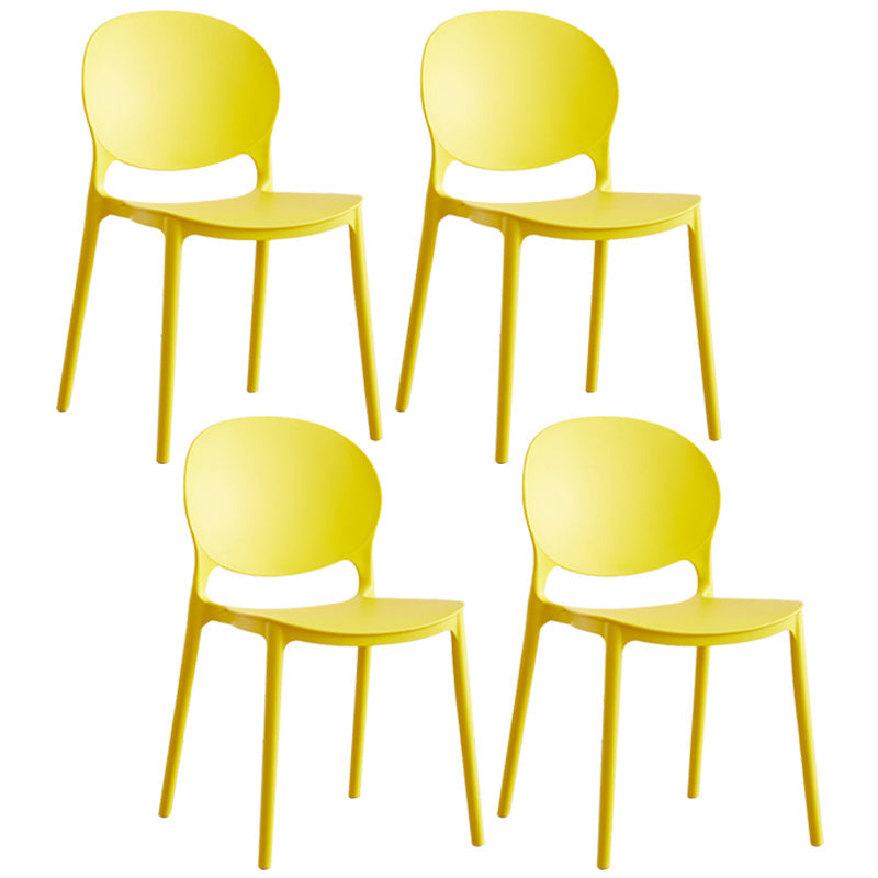 Scandinavian Plastic Armless Dining Chairs Indoor Stackable Side Chair Yellow 4 Piece Set Clearhalo ' kitchen&dining_furn' 'Dining Chairs' 'Dining Tables & Seating' 'dining_chair' 'furn' 'furn_dining_chair' 'Furniture' 'furniture_dining_chair' 'Kitchen & Dining Furniture' 'kitchen' 3741089