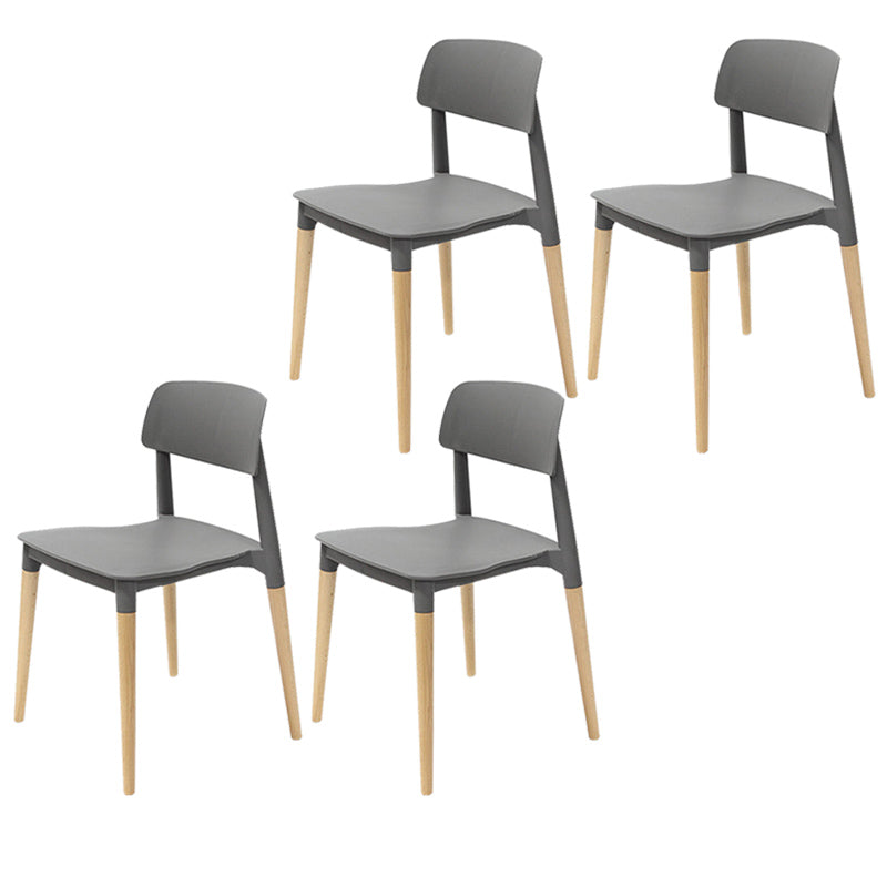 Plastic Stackable Armless Dining Chairs Open Back Side Chair with Wood Legs Grey 4 Piece Set Clearhalo ' kitchen&dining_furn' 'Dining Chairs' 'Dining Tables & Seating' 'dining_chair' 'furn' 'furn_dining_chair' 'Furniture' 'furniture_dining_chair' 'Kitchen & Dining Furniture' 'kitchen' 3741290