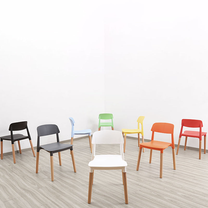Plastic Stackable Armless Dining Chairs Open Back Side Chair with Wood Legs Clearhalo ' kitchen&dining_furn' 'Dining Chairs' 'Dining Tables & Seating' 'dining_chair' 'furn' 'furn_dining_chair' 'Furniture' 'furniture_dining_chair' 'Kitchen & Dining Furniture' 'kitchen' 3741306